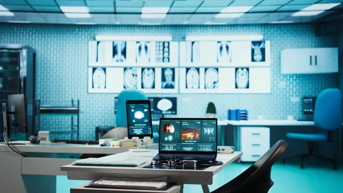 clinic staff with tablet or computer