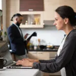 Hotel front desk staff using managed IT systems provided by PANAT Experts in Wisconsin